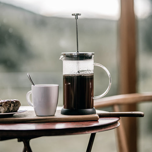 french press pour over with outdoor view